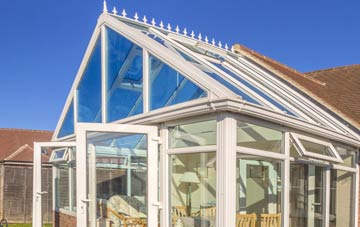 conservatory roof insulation costs Dunsfold Common